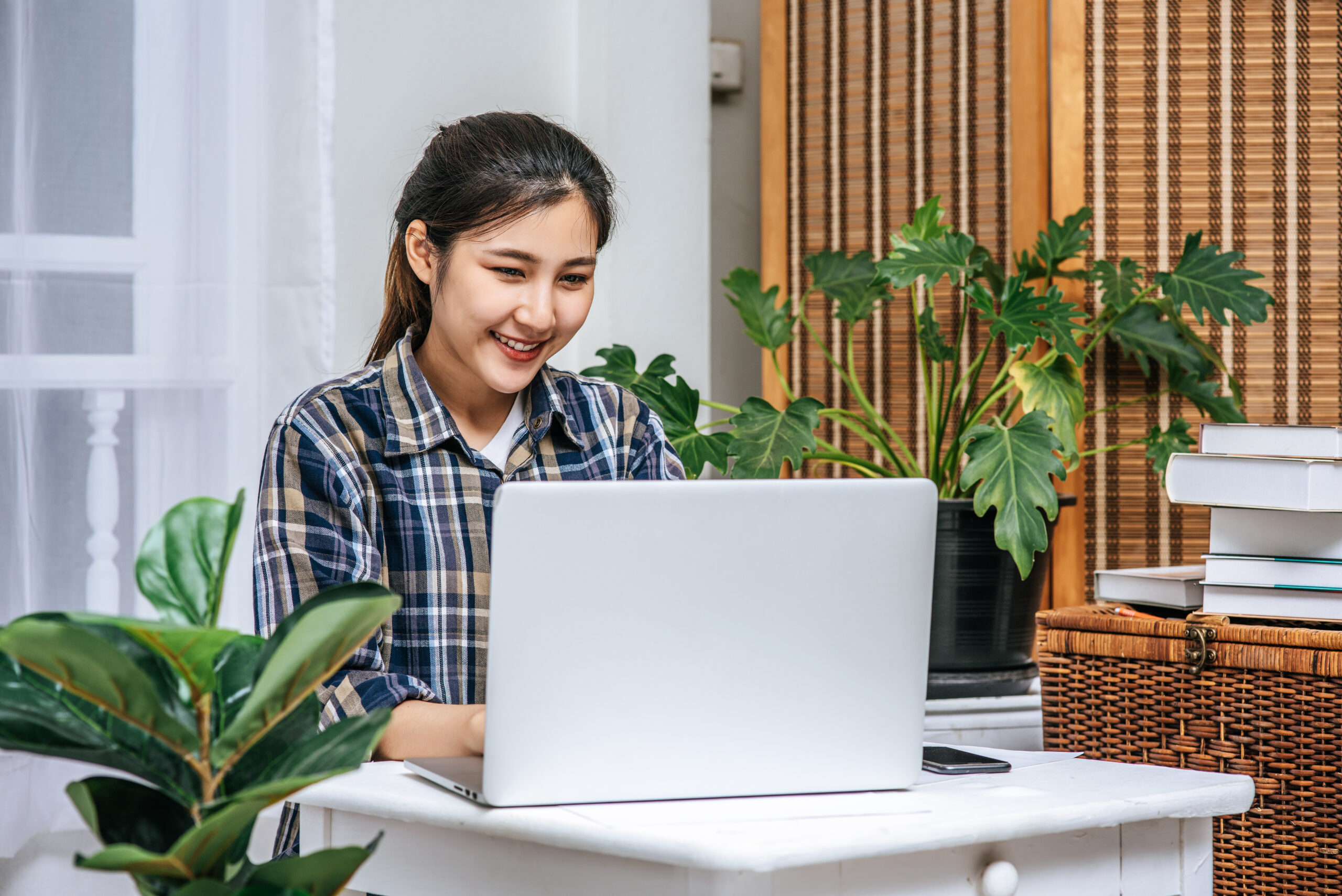 Women use laptops in the office with pleasure.